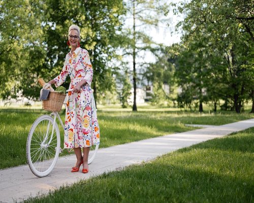 elderly person enjoying a healthy walk in a sunny park